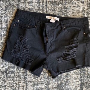 Distressed black shorts